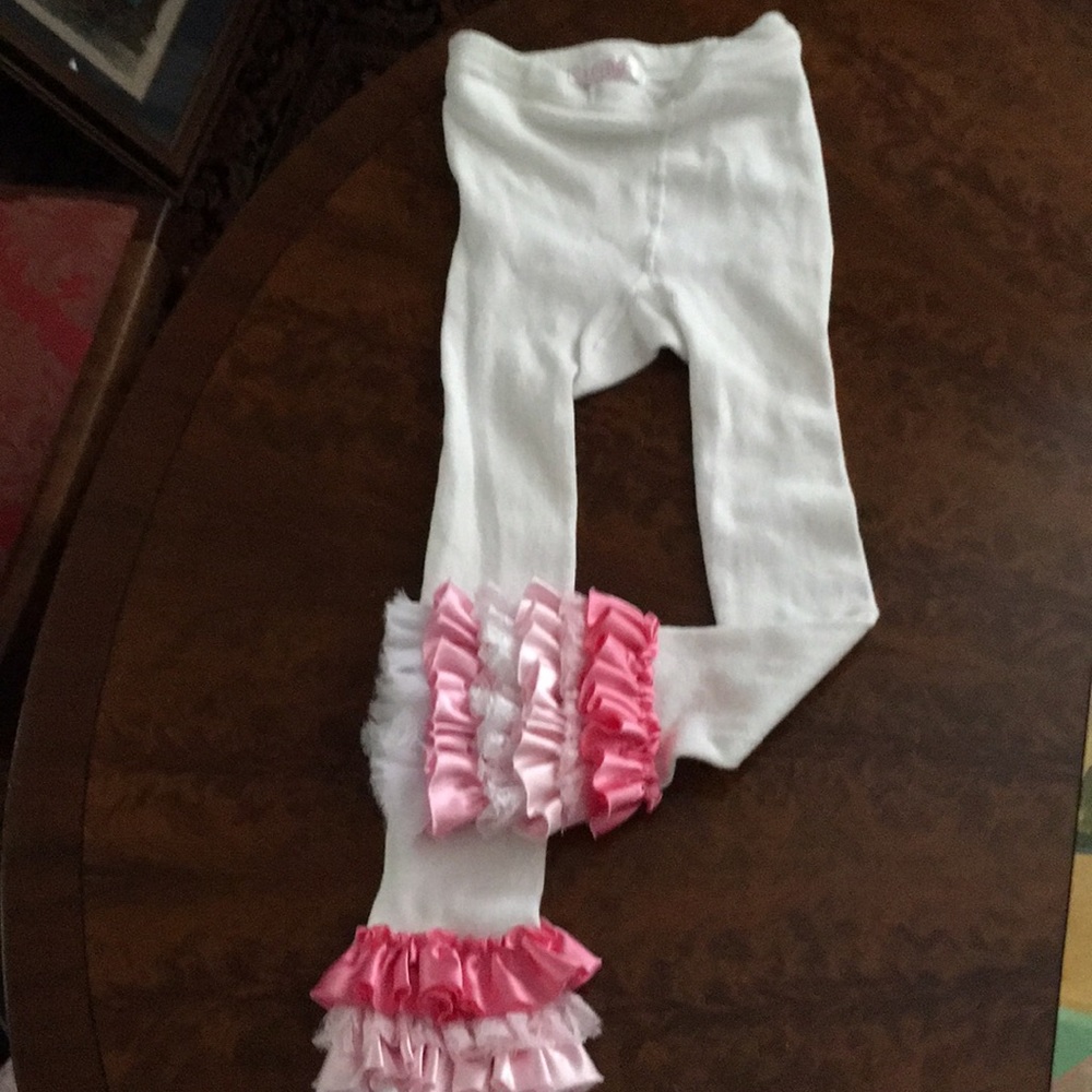Girls white leggings with pink satin at bottom